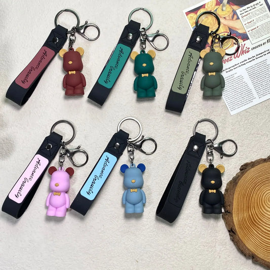 Porte-clés ourson en résine, nœud papillon